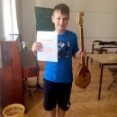 Članovi HKUD-a Korenica na radionici sviranja dangubice